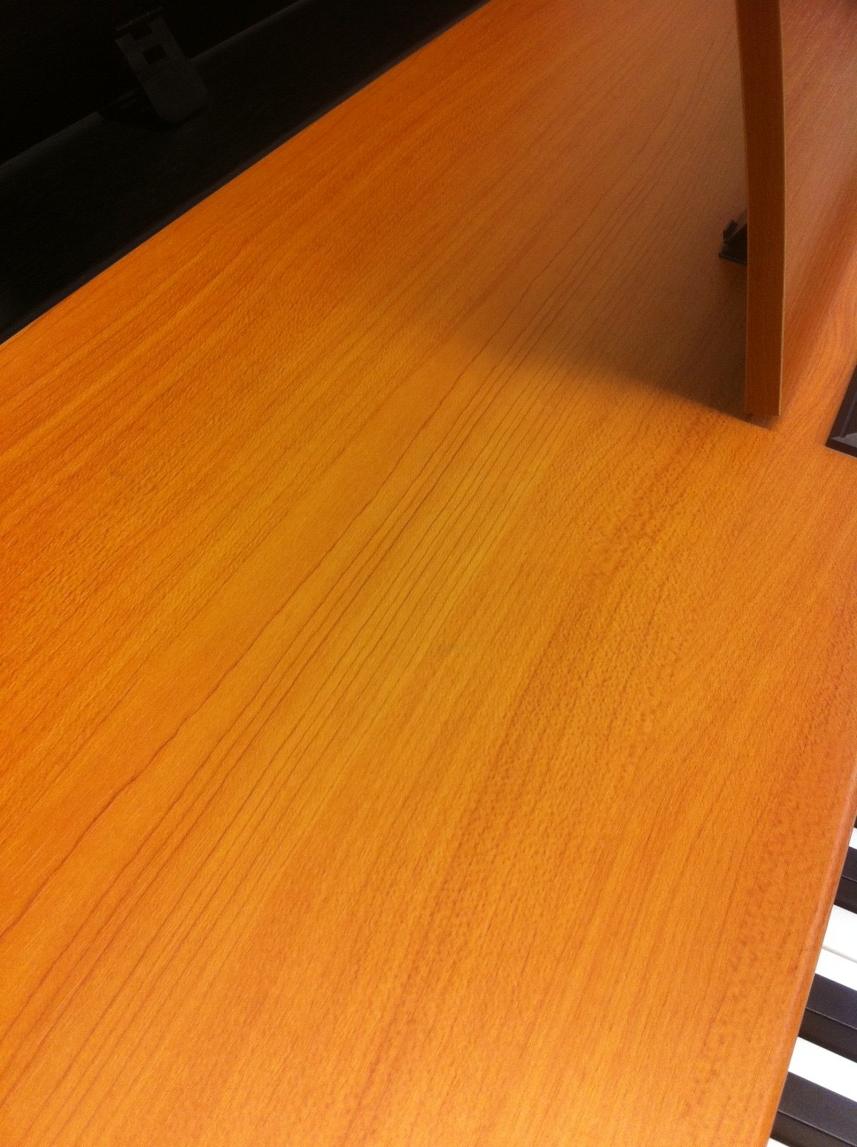 Close up of cherry wood finish
