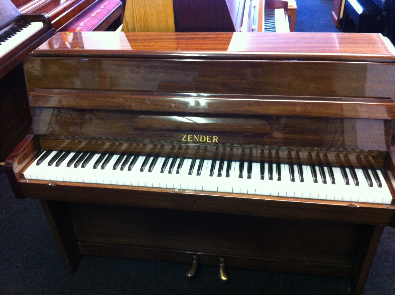Zender Piano polished walnut
