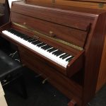 Zender acoustic upright piano in mahogany
