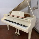 Second hand Cranes baby grand piano in white