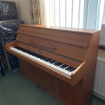 Second hand Kemble upright in medium mahogany